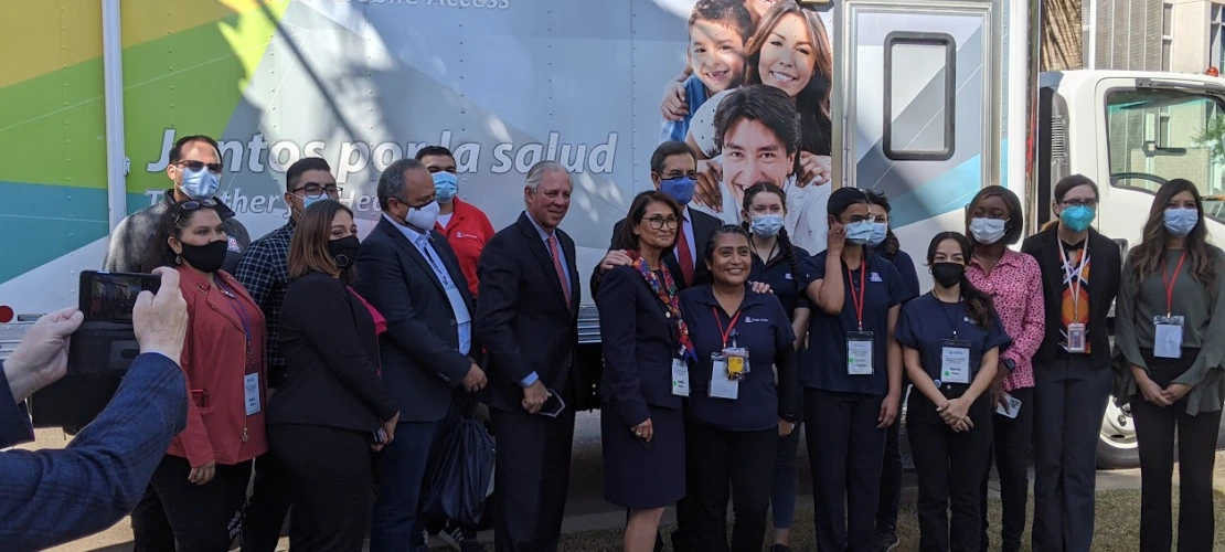 Ambassador Moctezuma and President Robbins with College of Public Health's Mobile Health Unit