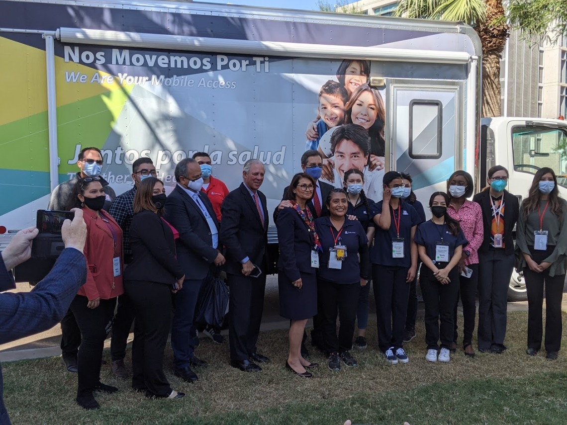 Ambassador Moctezuma and President Robbins with College of Public Health's Mobile Health Unit