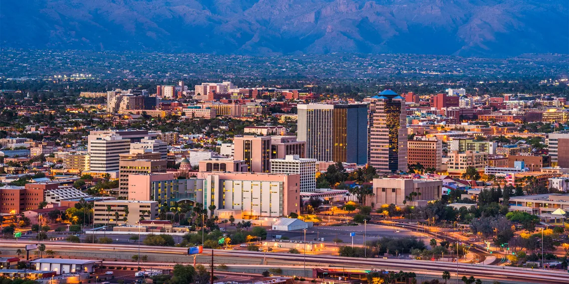 Tucson skyline cityscape and Santa Catalina Mountains at sunset.